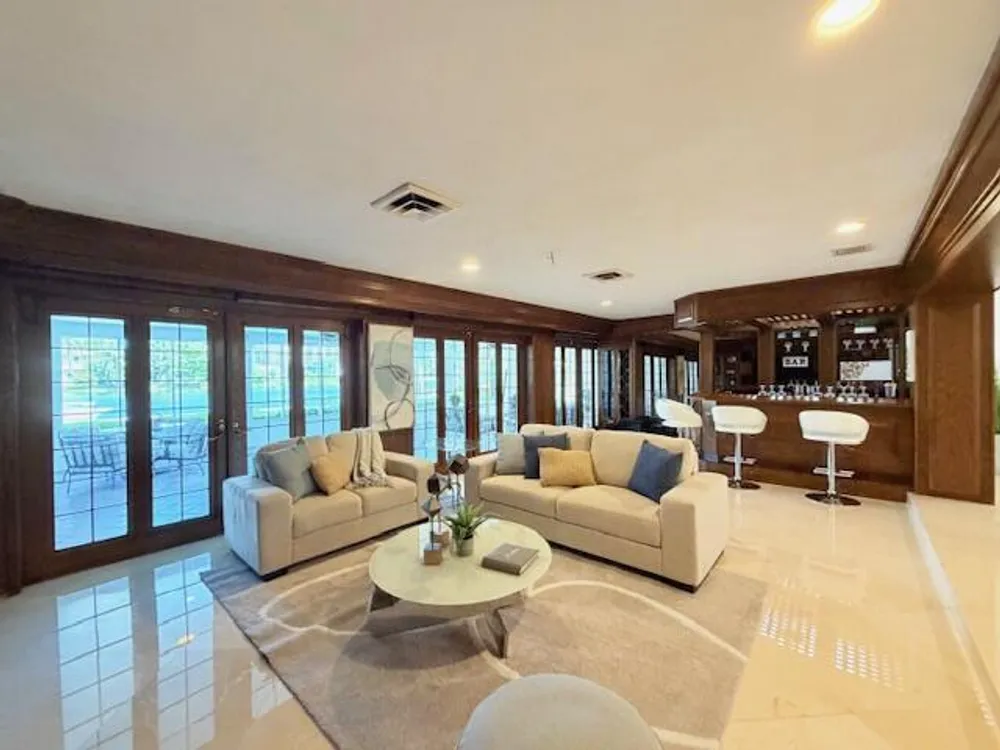 57 Cayuga Rd, Sea Ranch Lakes, FL 33308