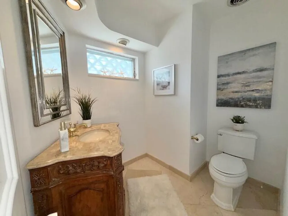 57 Cayuga Rd, Sea Ranch Lakes, FL 33308
