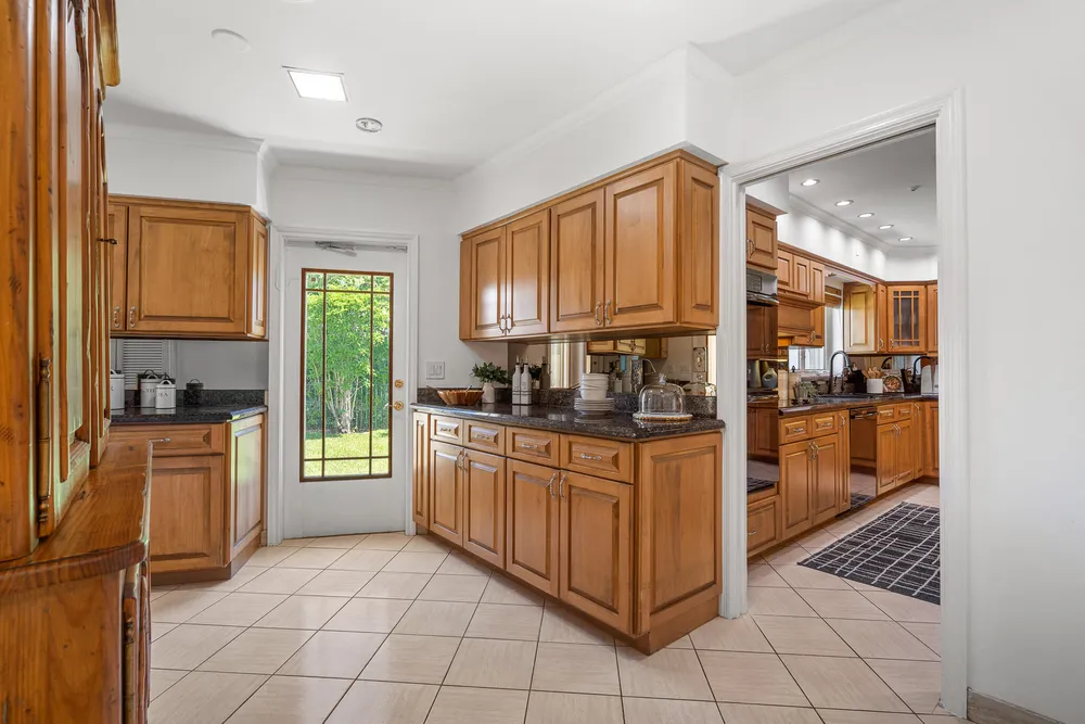 57 Cayuga Rd, Sea Ranch Lakes, FL 33308