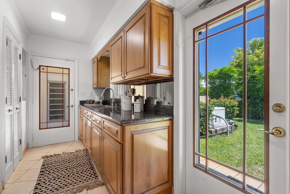 57 Cayuga Rd, Sea Ranch Lakes, FL 33308