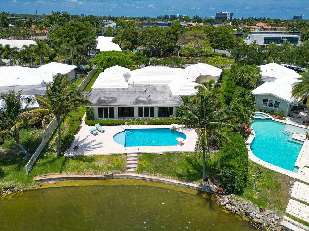 57 Cayuga Rd, Sea Ranch Lakes, FL 33308