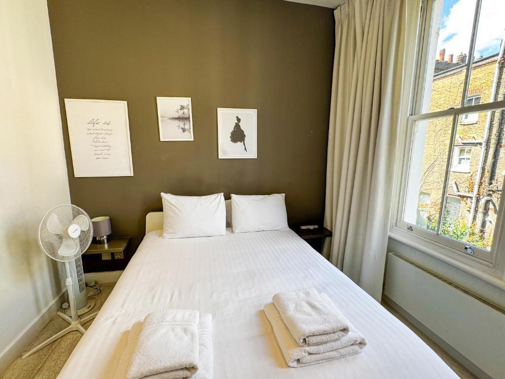 Flat 3, Comeragh Road, London Image 7