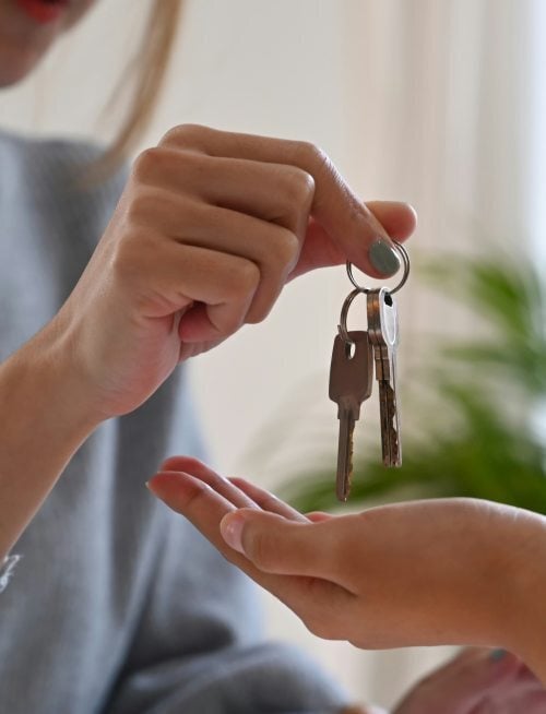 keys being handed to someone
