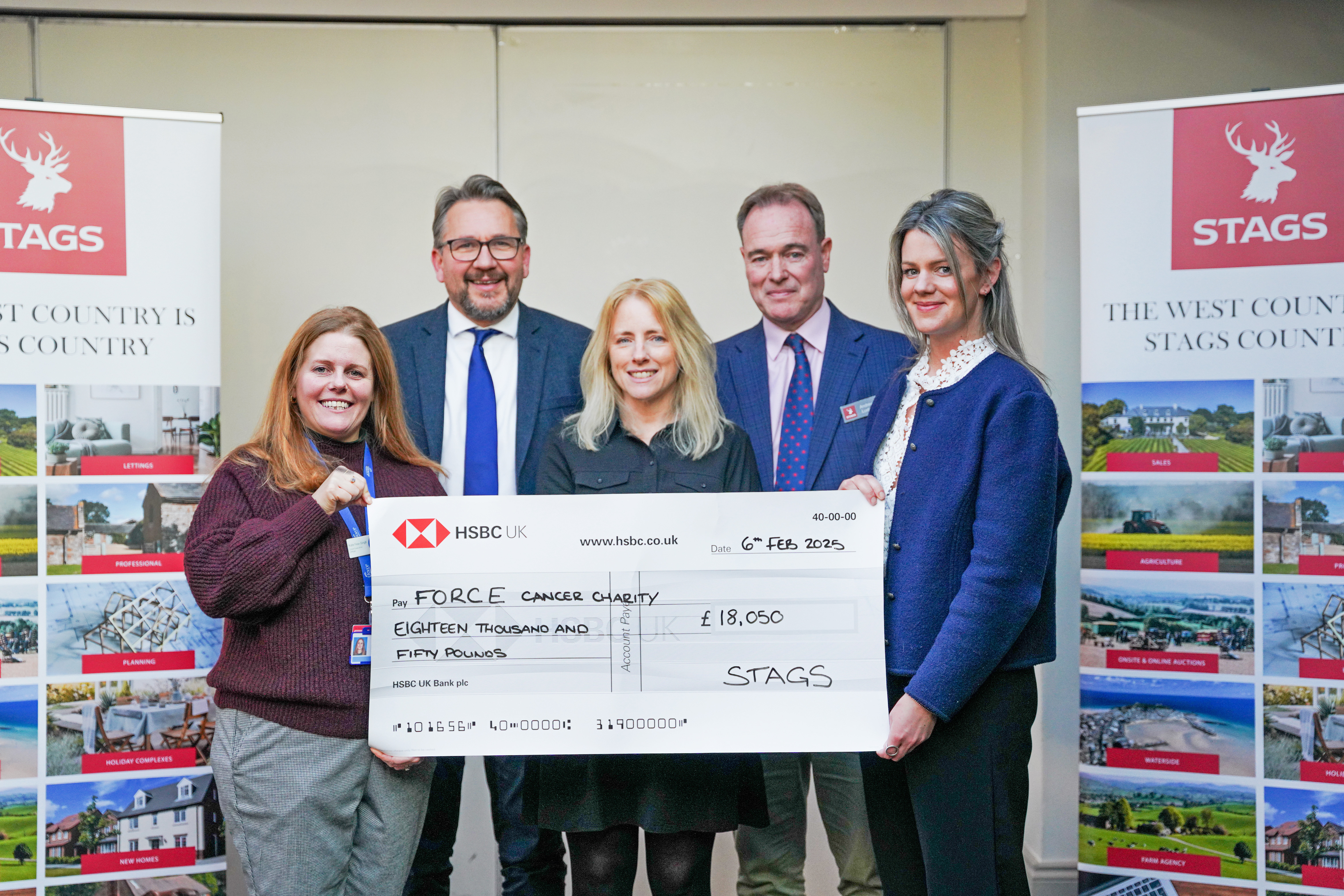 FORCE Cancer Charity accepting the fundraising cheque from Lee, Tracey, and Andrew, Stags Partners, as well as Laura from Stags Exeter.  