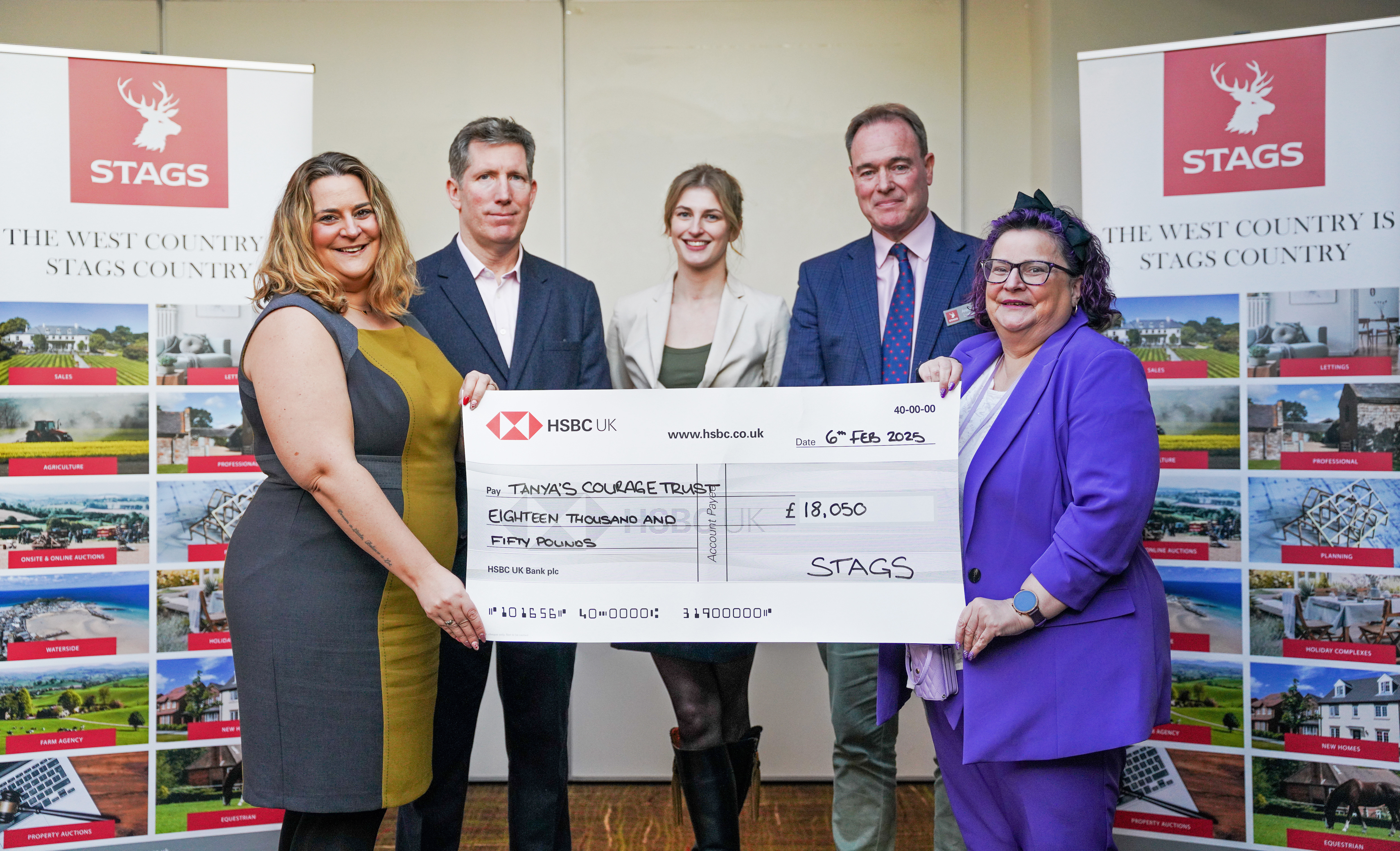 Tanya's Courage Trust accepting the fundraising cheque from Alex Rew and Andrew Luxton, Partners, and Jess Withers, Stags Marketing Executive.
