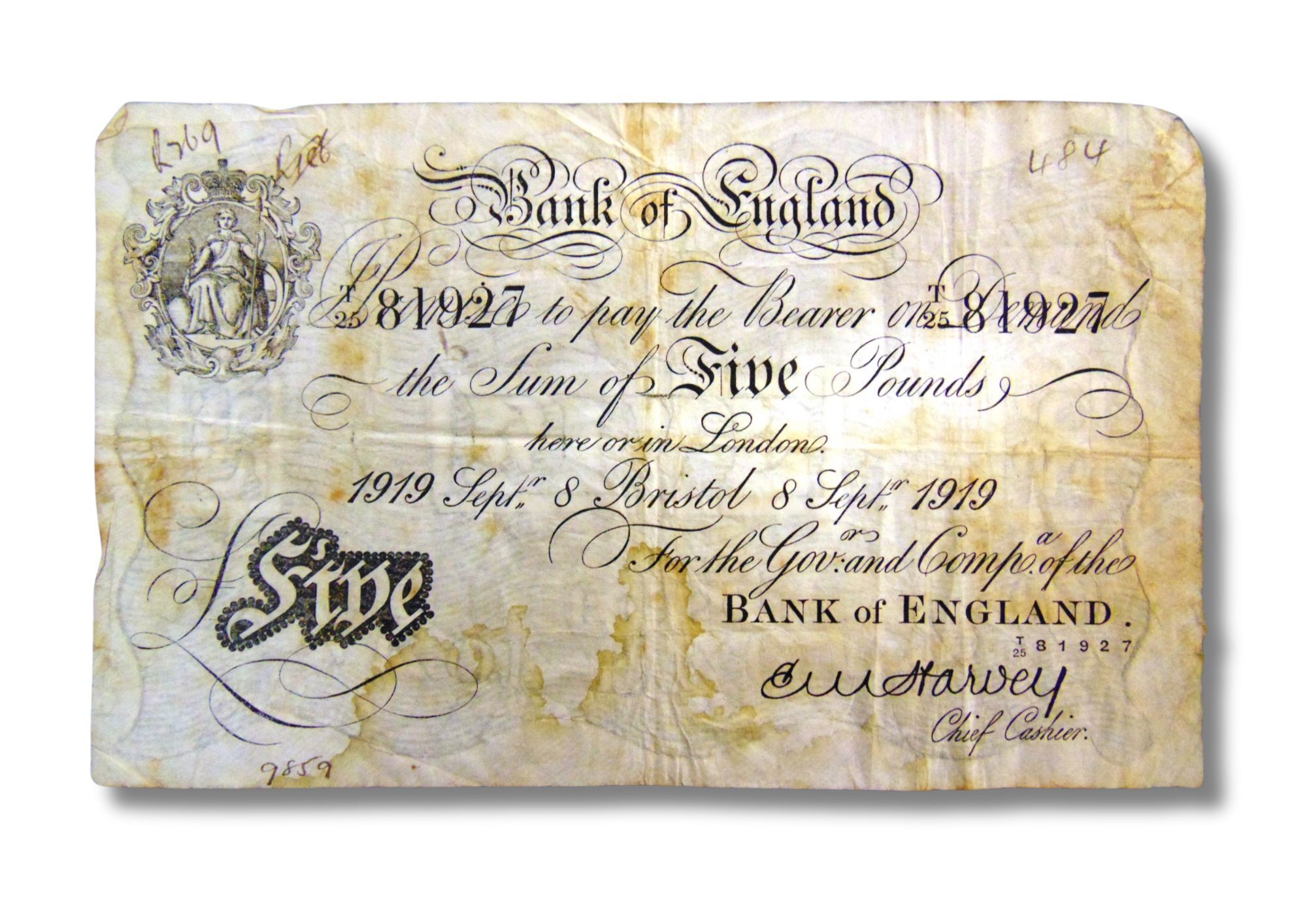 An old five pound bank note in poor condition