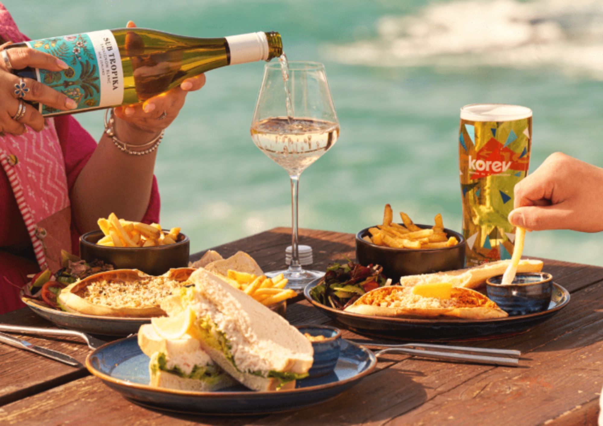 Restaurant table with sea view behind