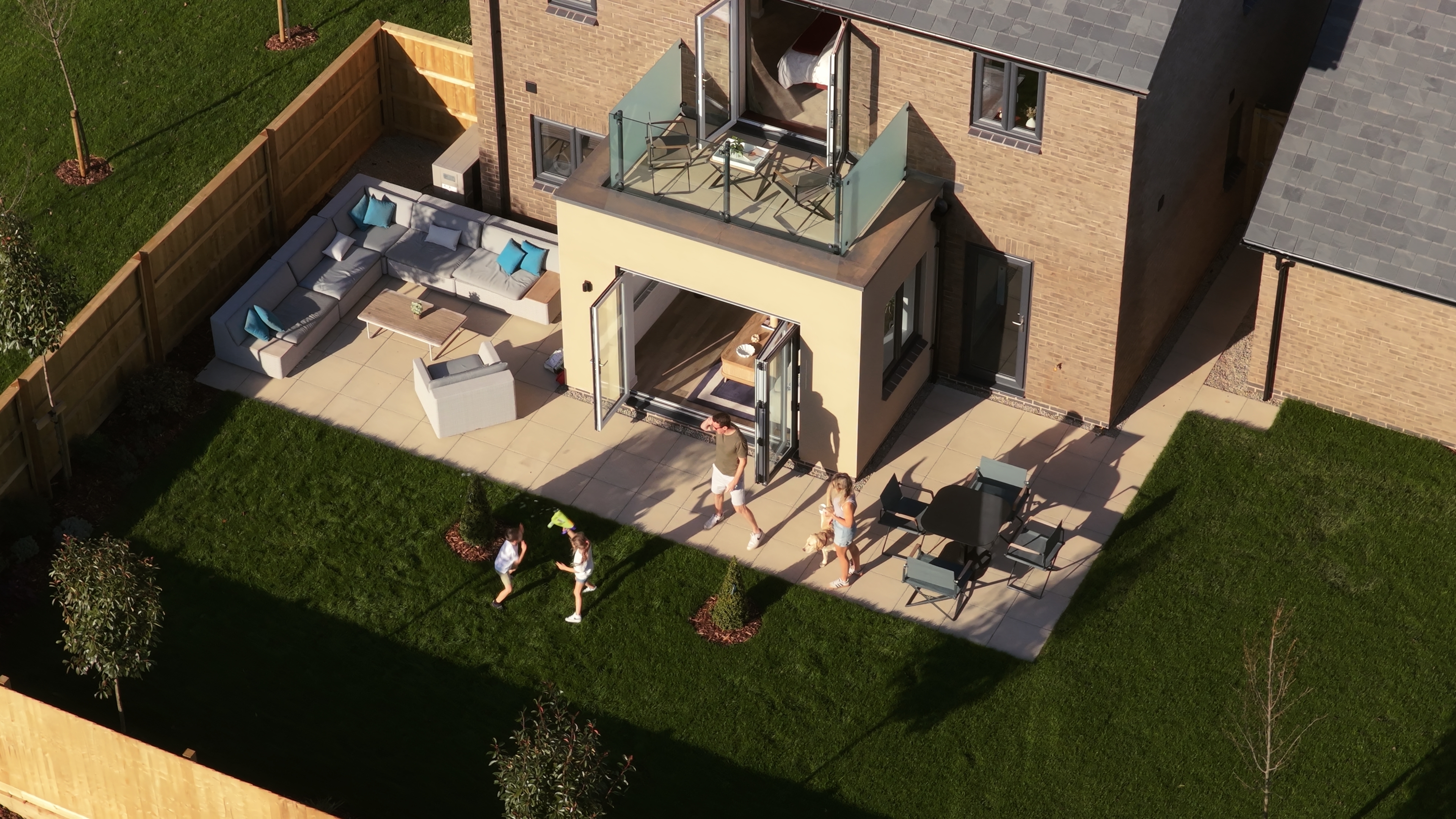 family playing in back garden