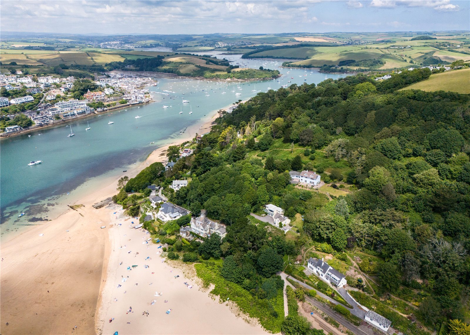 mill bay beach looking over smalls cove and east portlemouth, the estuary and salcombe town